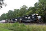 NS 3059 leads train E04 eastbound out of the yard